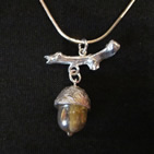 Pendant: oak twig with gold acorn