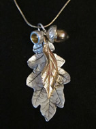 Pendant: oak leaf with acorn cups and gold acorn