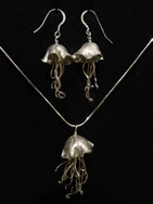 Sea urchin pendant; matching earrings