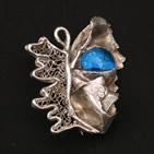 Silver leaf brooch with small turquoise dichroic glass orb inset