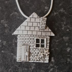 Pendant with house design