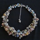 Necklace of lampwork beads on silver settings