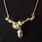 Necklace: oak twig with gold-lined acorn cups and acorn pendant