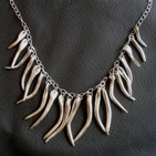 Necklace with thin silver seed-pods