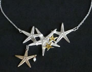Necklace: silver and gold starfish