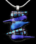 Abstract pendant of dichroic glass shapes in patterns and shades of blue