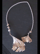 Necklace: offset ginko leaves, beads